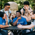 Diverse group of students talking together