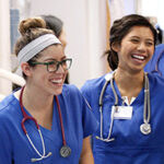 Two students training to become medical professionals